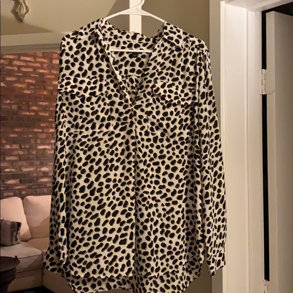 A cheetah print blouse